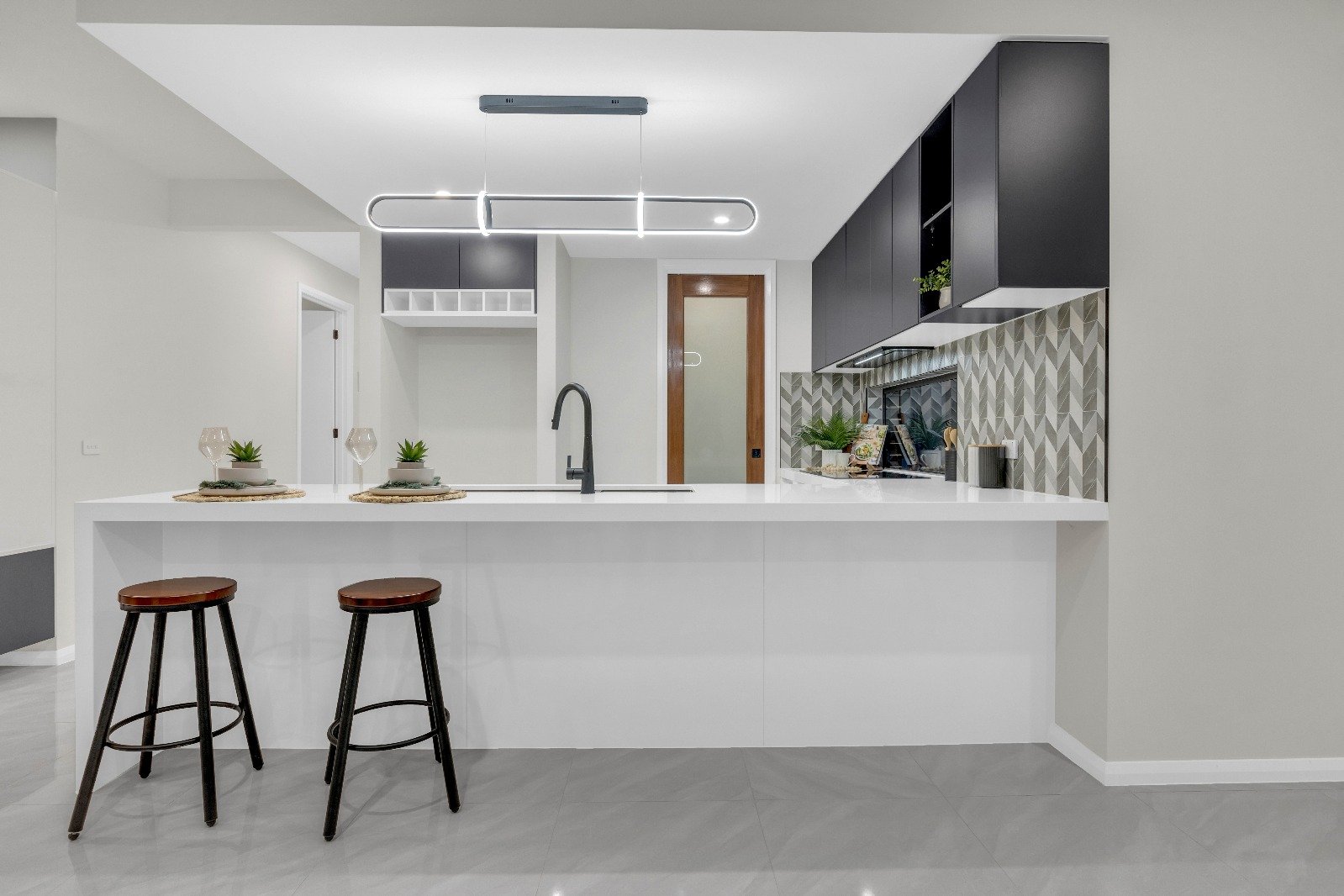Kitchen island in a completed Atelier Gill home